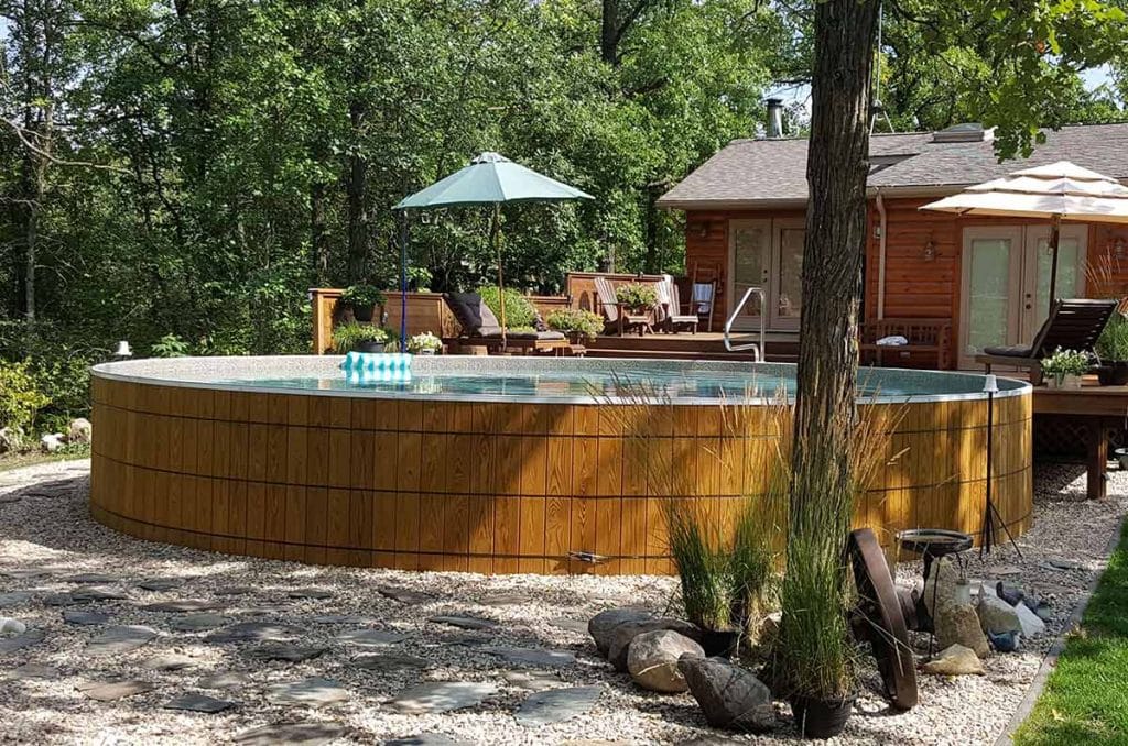 photo of a round wooden above ground pool