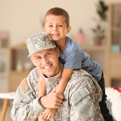 photo of a military father and his son